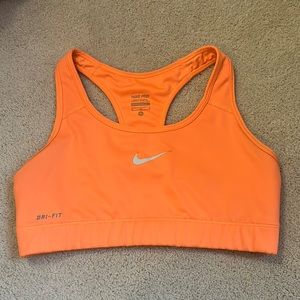 orange nike sports bra